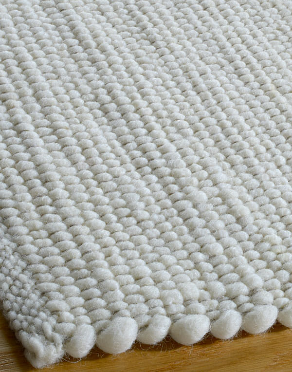 Tappeto su misura intrecciato in lana